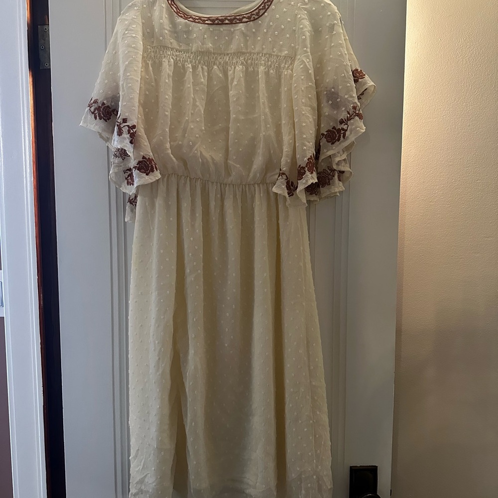 Elegant Cream Midi Dress with Floral Accents